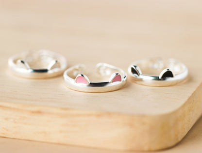 Classy Cat Ring Premium Style Set featuring stylish silver cat ear rings in pink and black accents.